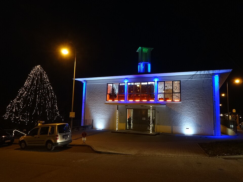 The illuminated former church building of Akademiebühne Baden-Baden